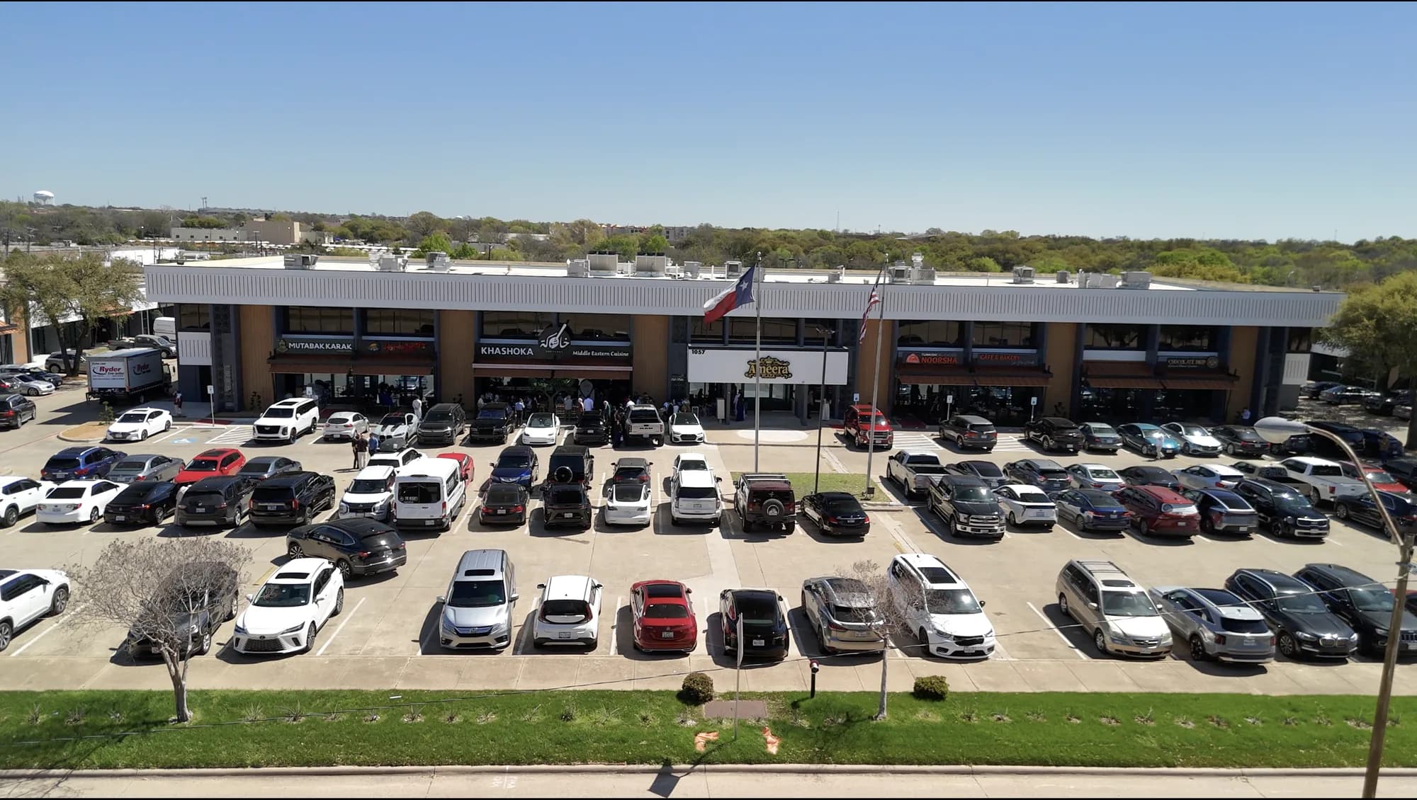Al Ameera Plaza at 1057 South Sherman Street in Richardson, Texas, with its restaurant tenants and full parking lot